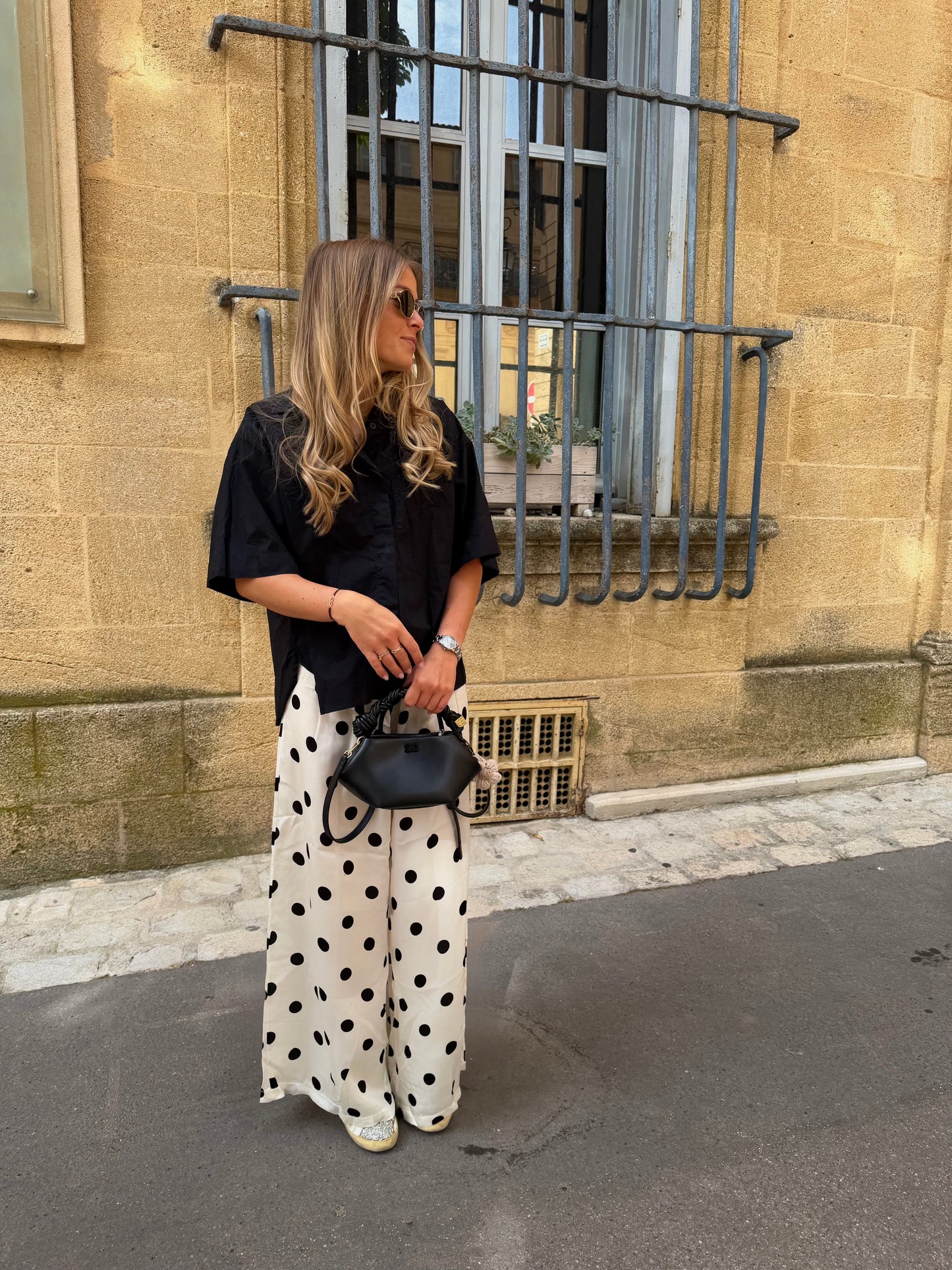 Pantalon satiné à pois